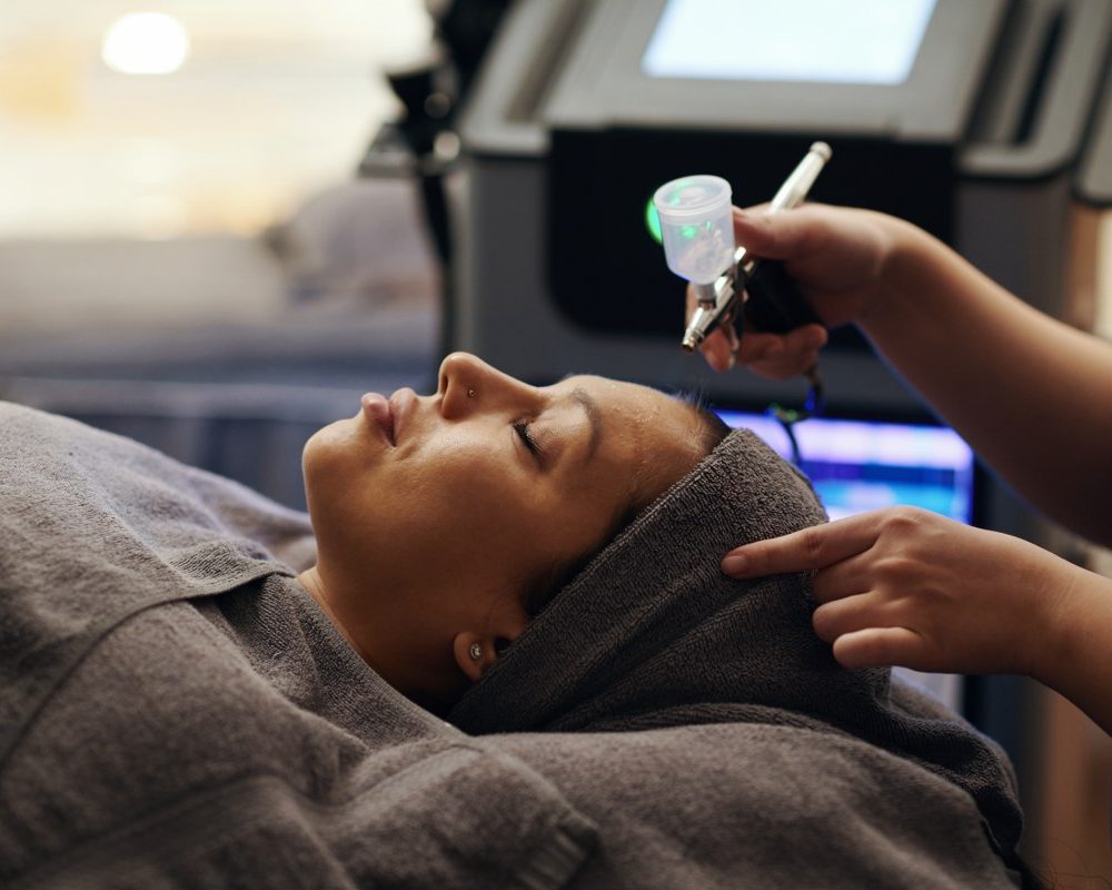 cosmetologist-spraying-treatment-2025-01-29-14-45-15-utc